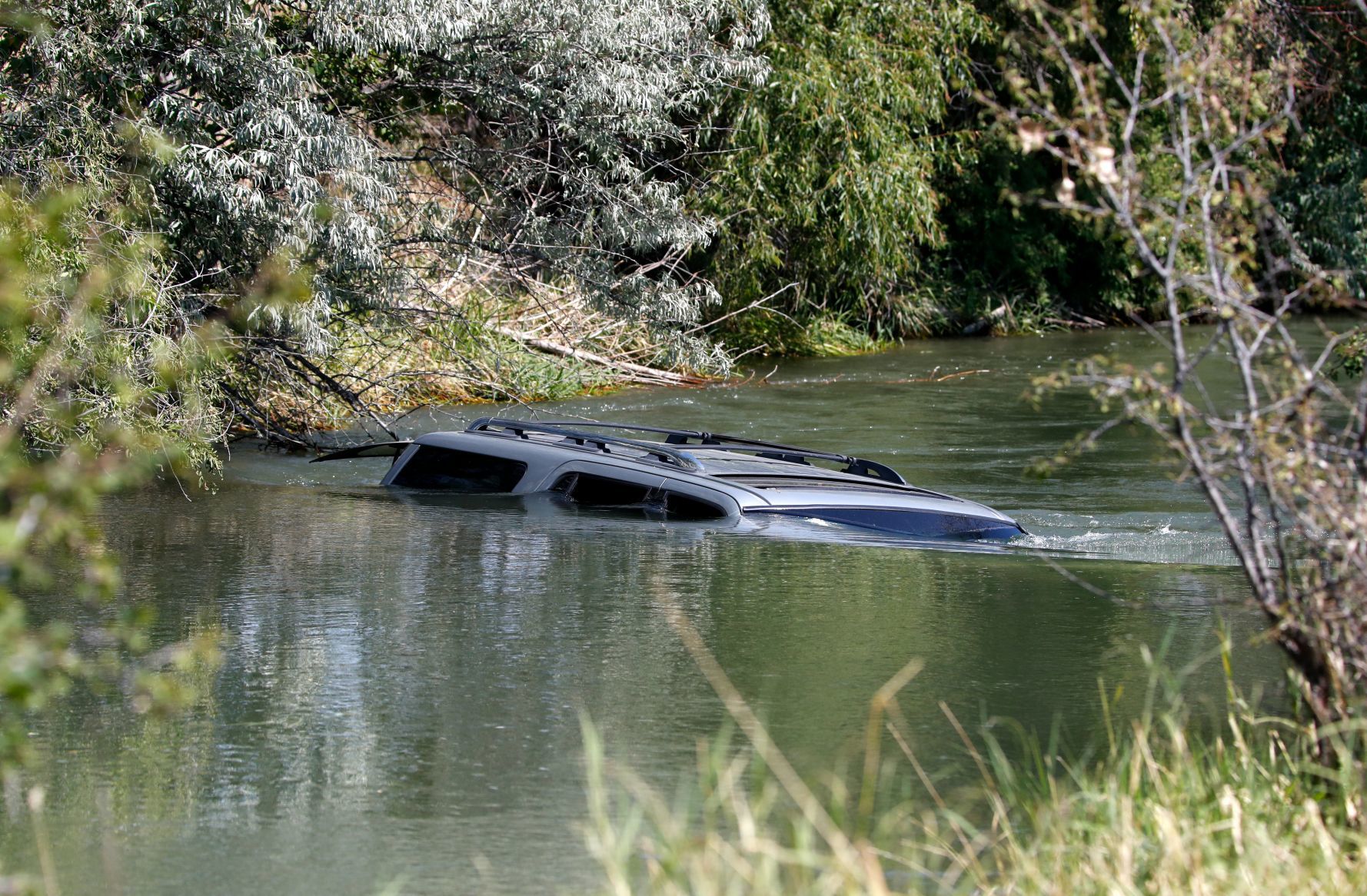 SUV in canal
